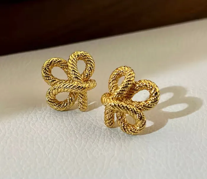 Get Signatured Rings Twisted Knot Studs