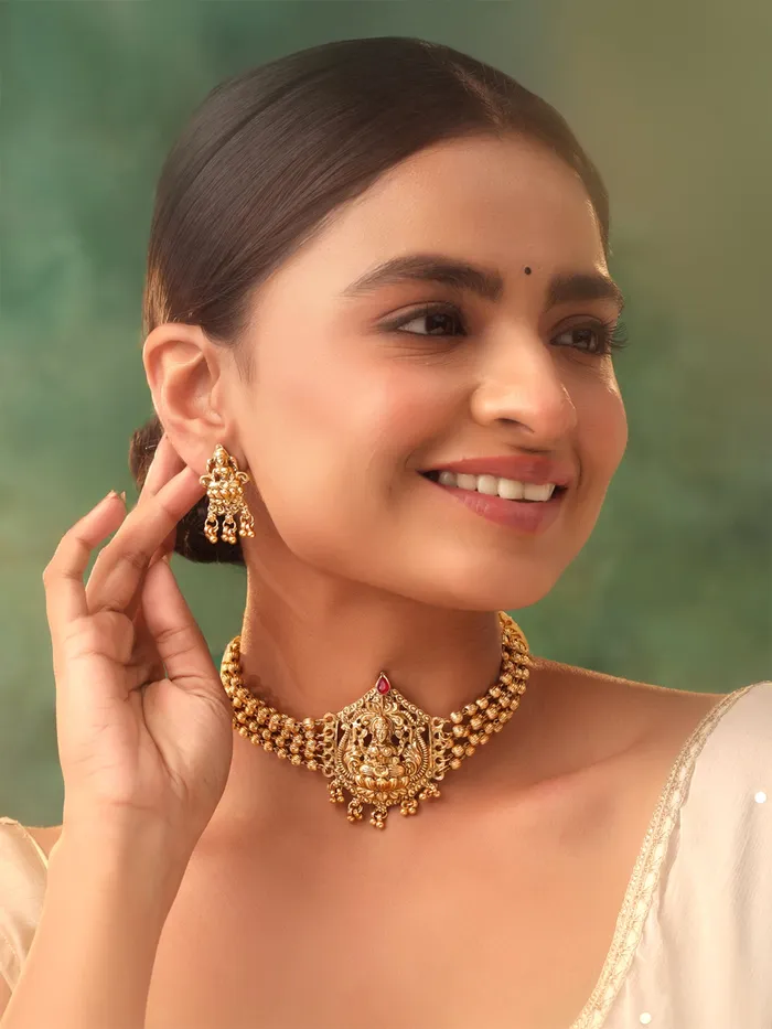 Necklaces Yellow Chimes Jewellery Set Gold Plated Choker Necklace with Lakshmi Motifs Earrings Included Adjustable Gold