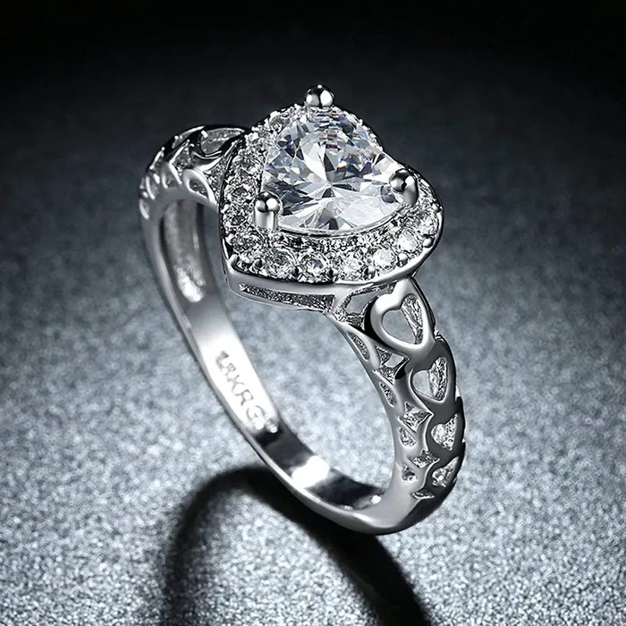 Rings Yellow Chimes Yellow Chimes Rings for Women Exclusive White Colored Stone Crystal Swarovski Collection Heart Shaped Silver plated Alloy Studded Ring for Women and Girls Size US 6