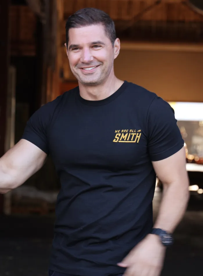 WE ARE ALL SMITH Mens Jewelry Clothing Earrings Gold We Are All Smith Embroidered Logo Black Unisex tshirt