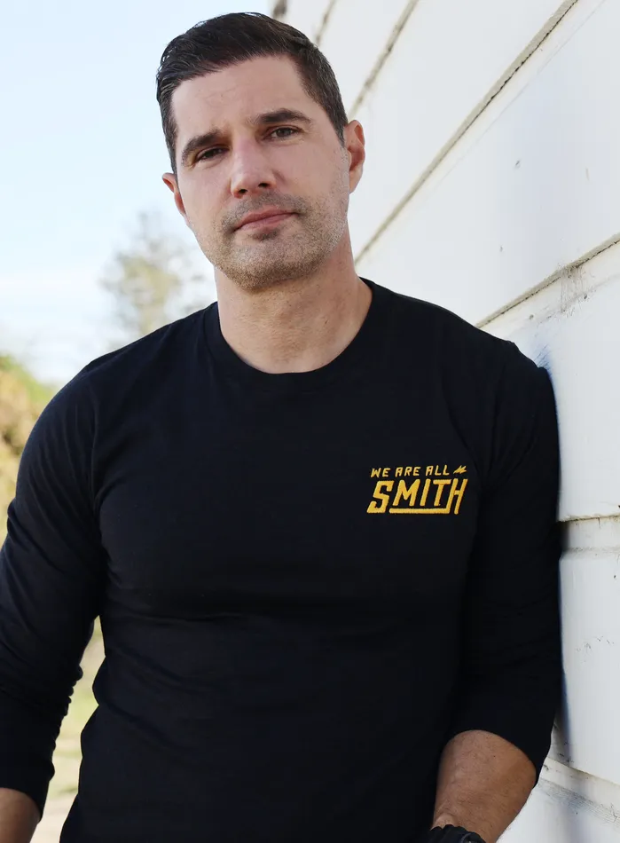WE ARE ALL SMITH Mens Jewelry Clothing We Are All Smith Logo Unisex Long Sleeve Tee Earrings WE ARE ALL SMITH Mens Jewelry Clothing We Are All Smith Logo Unisex Long Sleeve Tee Earrings