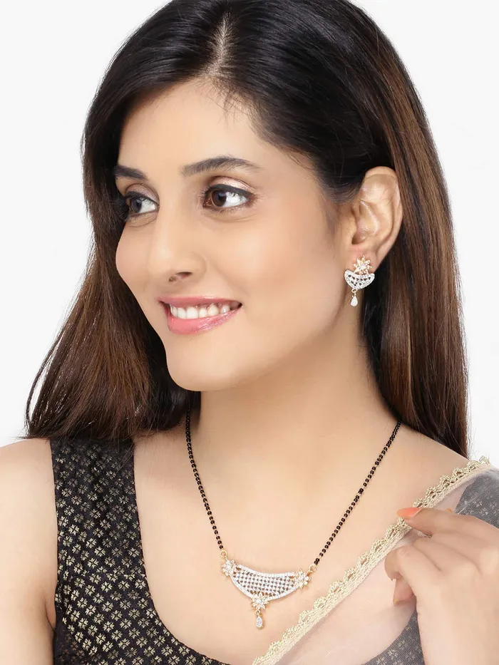 Yellow Chimes Classic Gold ADAmerican Diamond Studded Black Beads Designer Floral Mangalsutra Set with Earrings for Women Yellow Chimes Necklaces