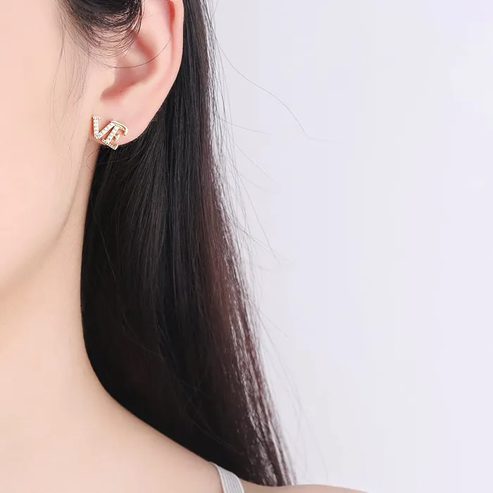 Yellow Chimes Earrings for Women and Girls Studs for Women Gold Toned LOVE Stud Earrings Birthday and Valentine Gift for girls and women Anniversary Gift for Wife Yellow Chimes Necklaces