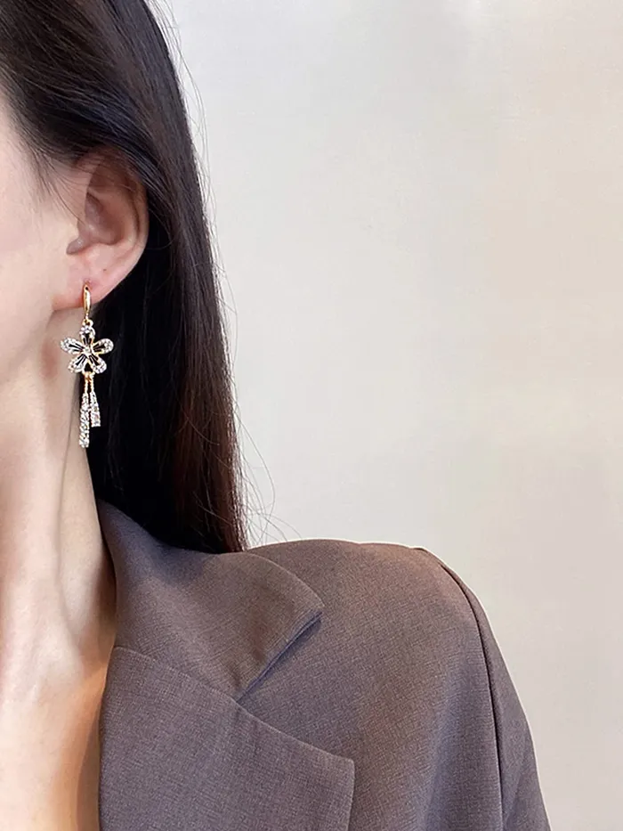 Yellow Chimes Earrings For Women Gold Toned Crystal Studded Flower Drop Chain Tassel Dangler Earrings For Women and Girls Yellow Chimes Necklaces