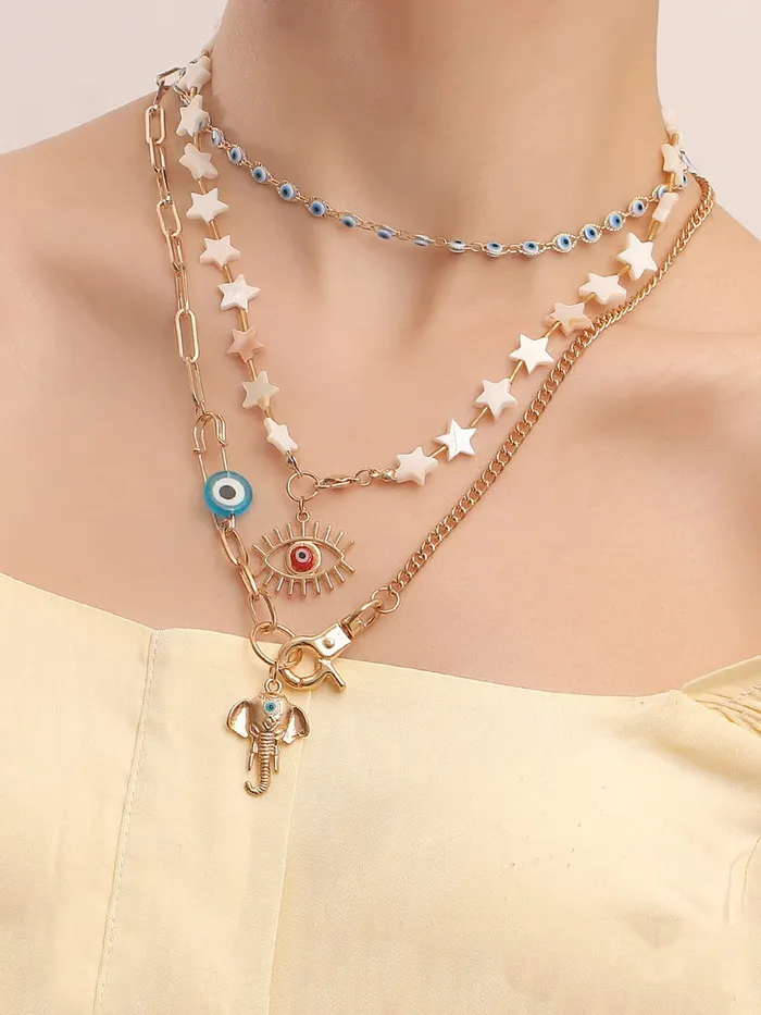 Yellow Chimes Necklace For Women Mixed Layered Chunky Gold Toned With Evil Eye Elephant Charm Beaded Star studded Neckchain For Women and Girls Yellow Chimes Earrings