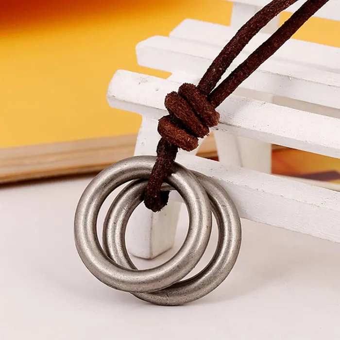 Yellow Chimes Stainless Steel Silver Circle Locket with Brown Leather Rope Pendant for Menand Boys Yellow Chimes Bracelets