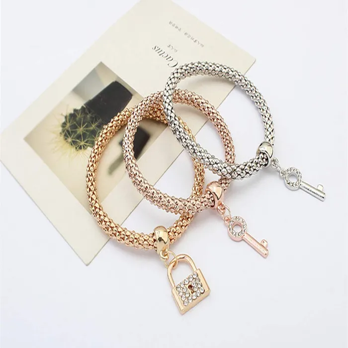 Yellow Chimes Yellow Chimes Lock and Key Charm Set of 3 Bracelets For Women And Girls Earrings